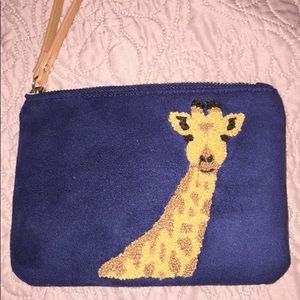 Small navy blue wallet/purse with giraffe print.